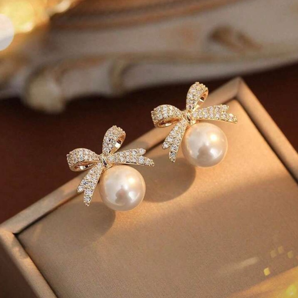 Elegant Pearl Bow Earrings with Crystal Details